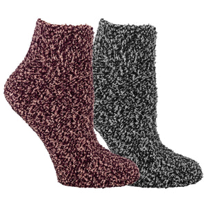 Two pairs of textured socks, one pink and one gray, on a white background.