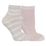 Two pairs of fluffy socks, one beige and one pink, on a white background.