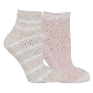 Two pairs of fluffy socks, one beige and one pink, on a white background.