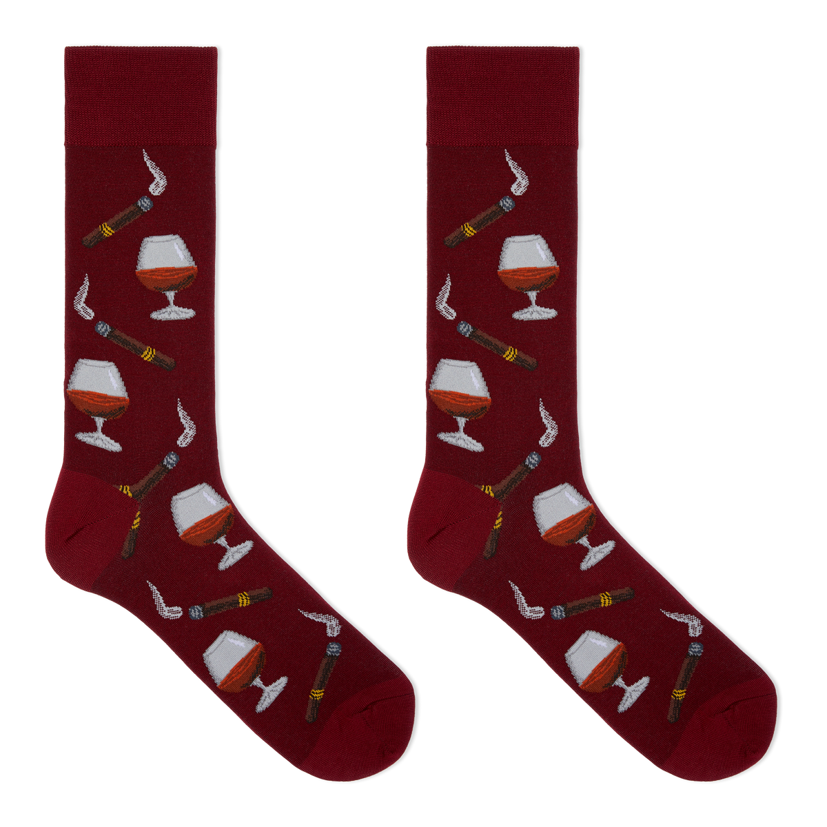 A pair of crew socks in deep burgundy with a repeating pattern of cigars, smoking pipes, and cognac glasses filled with amber liquid, shown on a plain white background.