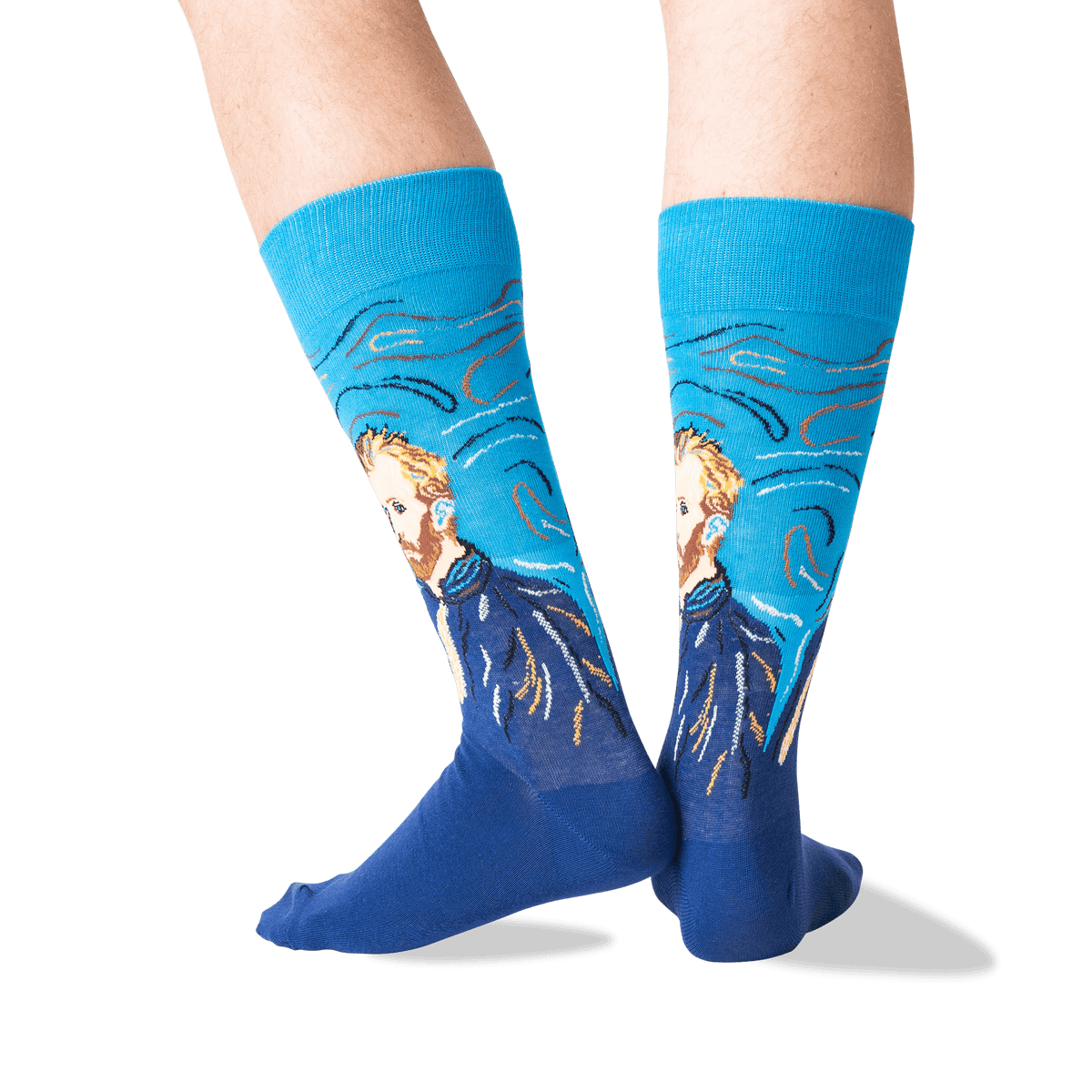 A person's legs wearing blue crew socks with a stylized portrait of Vincent van Gogh in a Van Gogh-inspired swirling composition, shown against a plain white background.