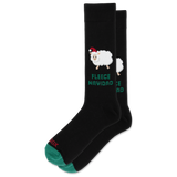 A pair of black crew socks with a festive Christmas design. The front sock features a white fluffy sheep wearing a red Santa hat above the green text 'FLEECE NAVIDAD MATA'.
