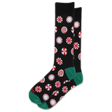 A pair of black crew socks with a red and white peppermint candy print and green toes and heels, displayed on a clean white background.