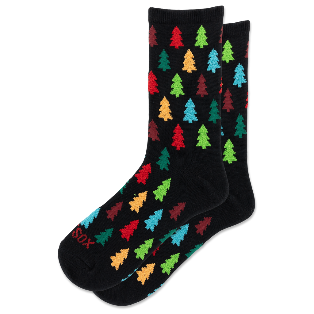 A pair of black crew socks with a colorful pattern of Christmas tree silhouettes in red, green, blue, orange, and yellow, displayed on a clean white background.