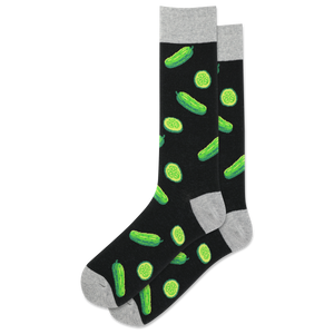 A pair of black crew socks with a pattern of green pickle designs, including whole pickles and pickle slices, with accent colors in the heel, toe, and cuff.