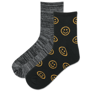 Set of colorful socks with smiley face patterns on a gradient background
