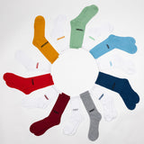 Assorted colorful socks arranged in a circular pattern on a white background thumbnail