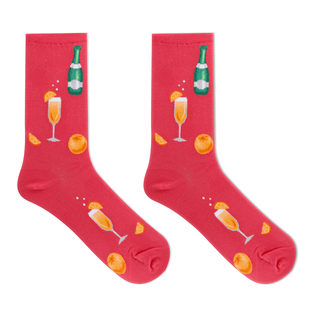 A pair of bright pink crew socks featuring a festive champagne-themed print with orange slices, champagne glasses, and a green champagne bottle, displayed against a solid white background.