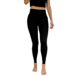 Person wearing black leggings on a white background thumbnail