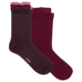 Three pairs of women's crew socks in dark plum, burgundy, and dusty rose, arranged overlapping on a plain white background. The brand name 'kbell' is printed in white on the toe of the front sock.