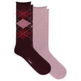 Two pairs of crew socks arranged overlapping on a white background: one dark burgundy pair with an argyle diamond pattern in red and pink and one heathered dusty pink pair. The burgundy sock has the brand name 'k.bell' printed near the foot.