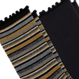 A close-up of a pair of black socks with one sock featuring horizontal stripes in black, gray, white, and shimmering gold, and the other sock is solid black, set against a plain white background. thumbnail