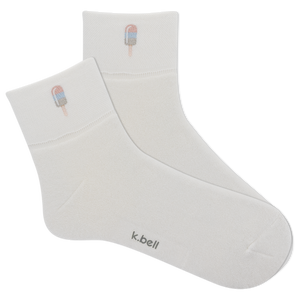 White socks with ice cream cone design and 'k.bell' branding on a white background