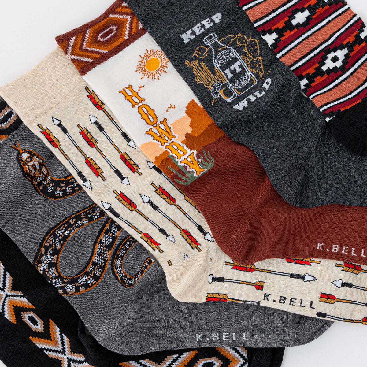 Collection of patterned socks with various southwestern designs on a white background