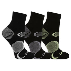 Three pairs of socks with colorful dot patterns on a white background