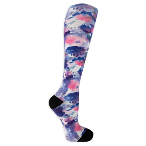 Dr. Scholl's women's compression socks featuring a black and white tie dye pattern and black accents at the heel and toe.