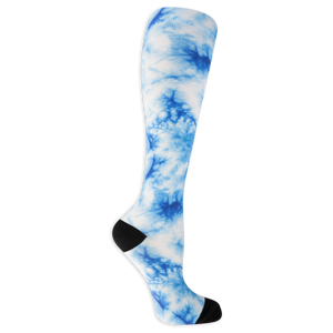 Dr. Scholl's women's compression socks featuring a blue and white tie dye pattern and black accents at the heel and toe.