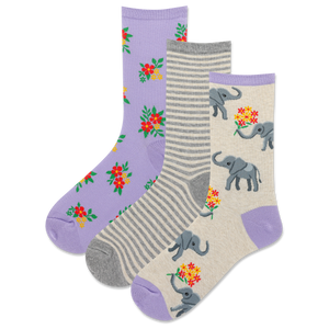 Three pairs of socks with elephant and floral patterns on a white background