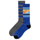 Two socks, one gray and one blue with a mountain design, on a white background.