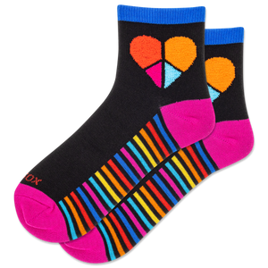 Colorful socks with heart and striped patterns on a white background