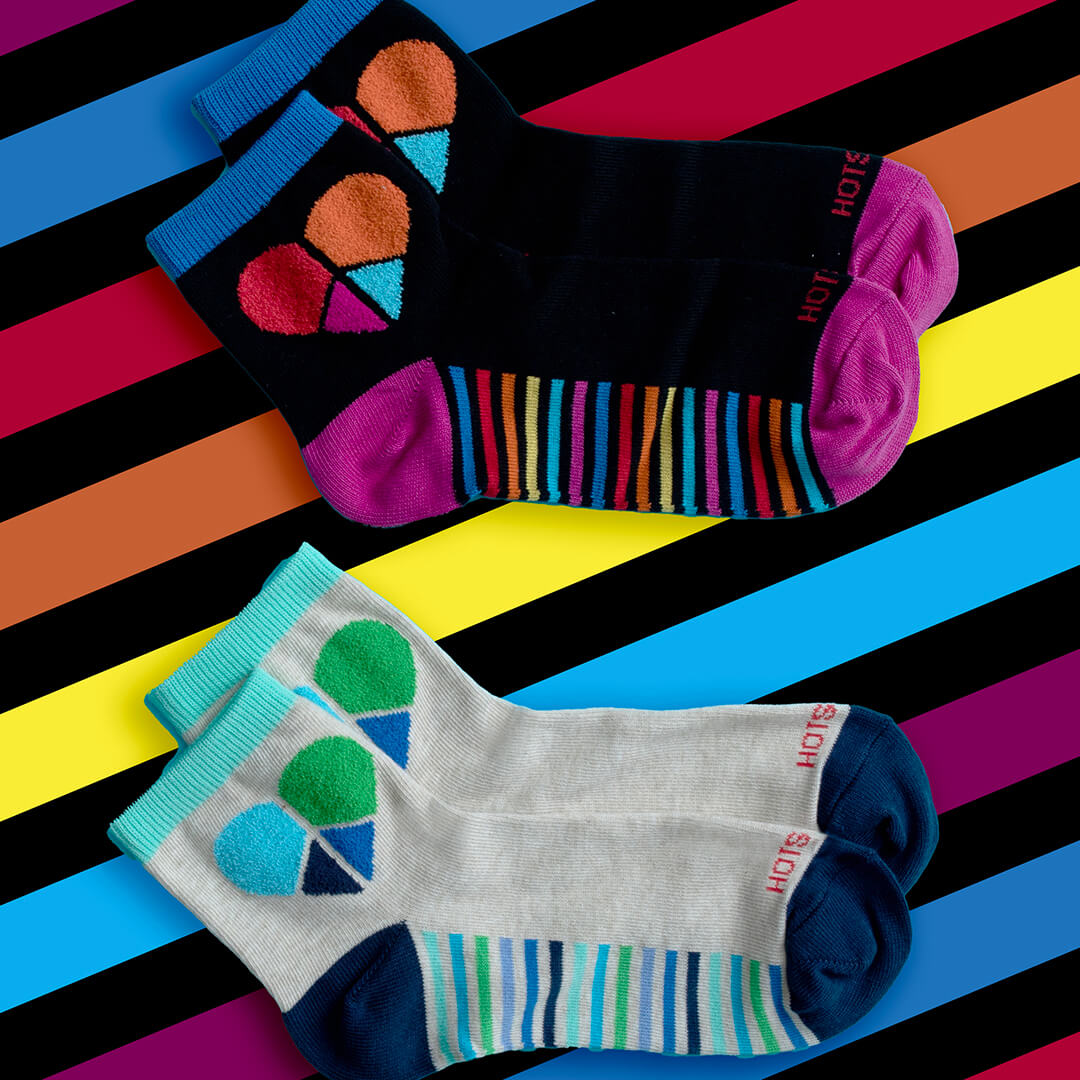 Women's fashion HOTSOX anklets with fuzzy heart motifs and stripes on the bottom of the foot