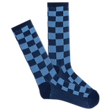 Pair of blue and navy checkered socks on a white background