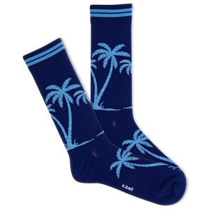 Navy blue socks with light blue palm tree design on a white background