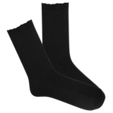 Pair of black microfiber socks on a white background