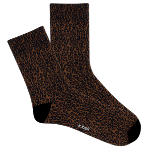 Pair of women's brown leopard print socks with 'k.bell' branding on a white background